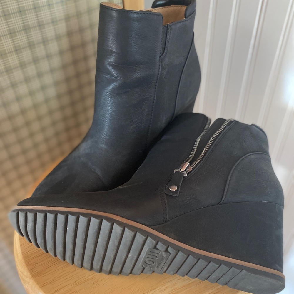 Lightly worn wedge boots.